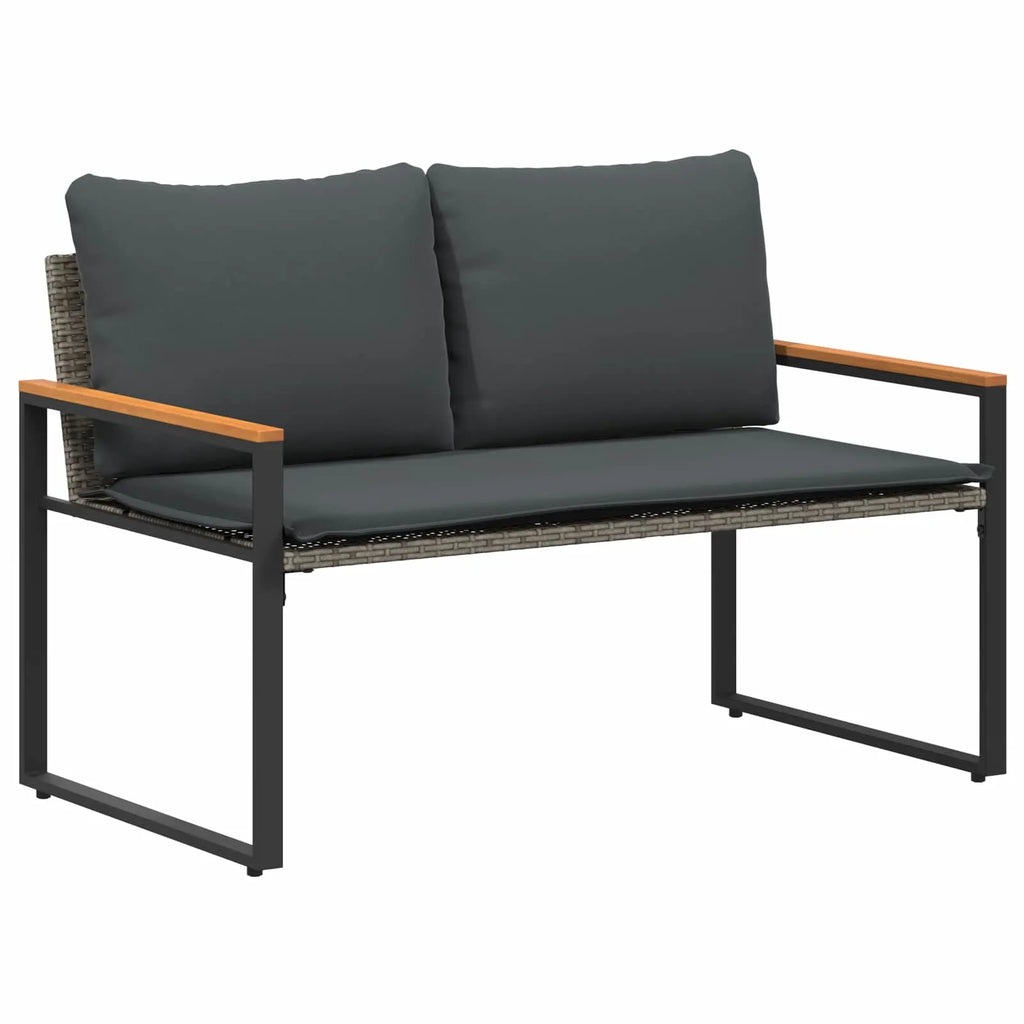 Banquette de jardin en rotin gris installée sur terrasse avec table d'appoint assortie
