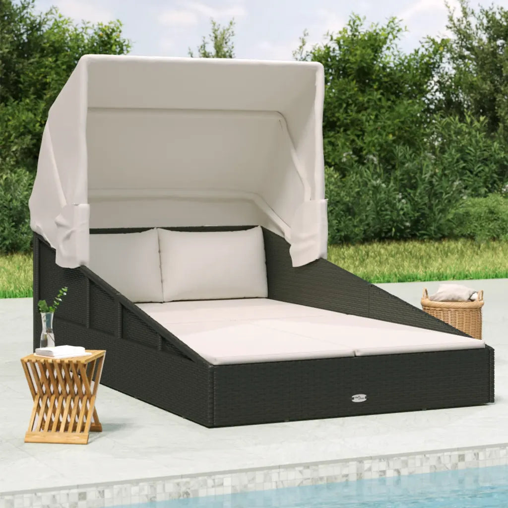 Canapé lit de jardin avec toit pliable en rotin PE noir, coussins blanc crème, bord de piscine