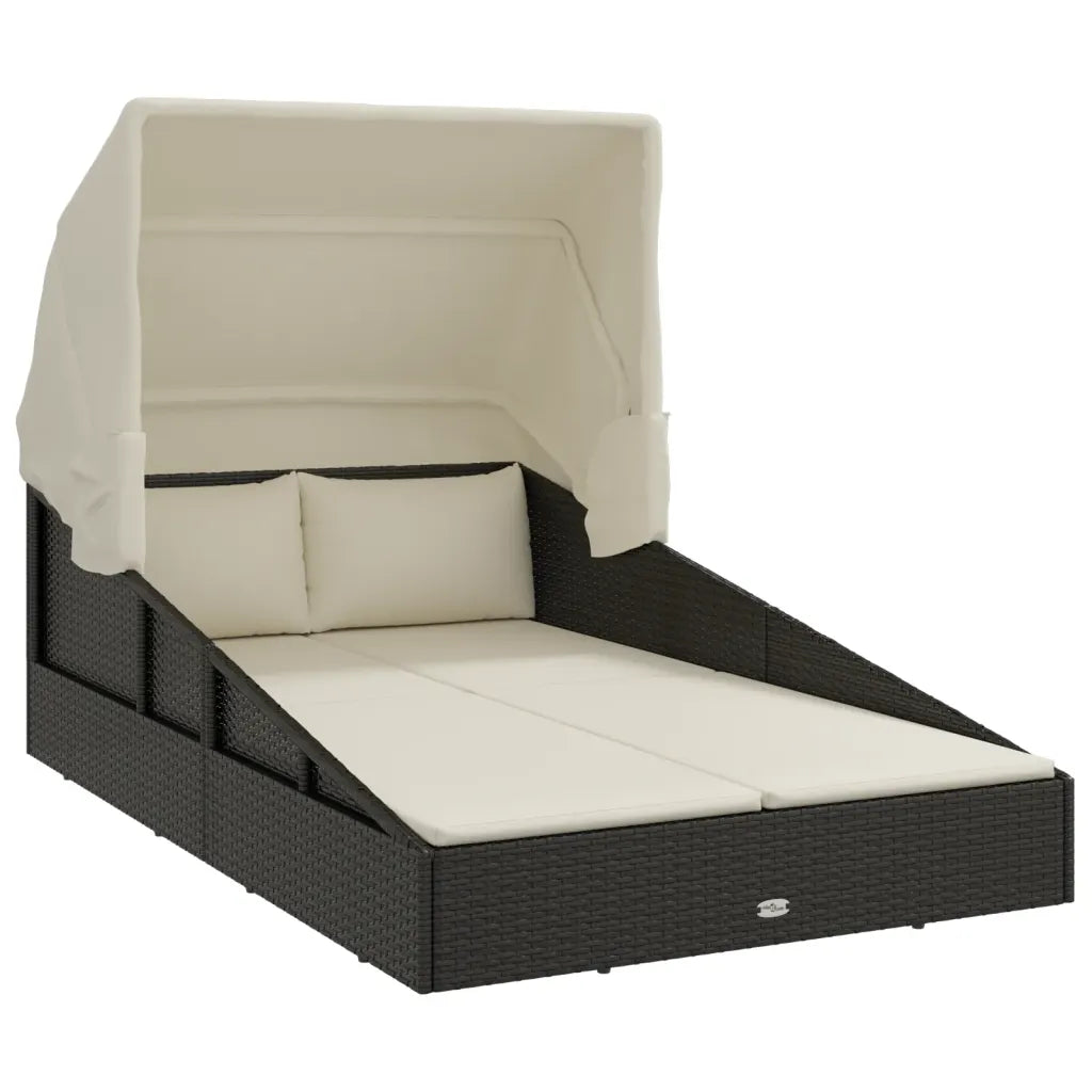 Canapé lit de jardin noir installé au bord de la piscine, capacité 110 kg
