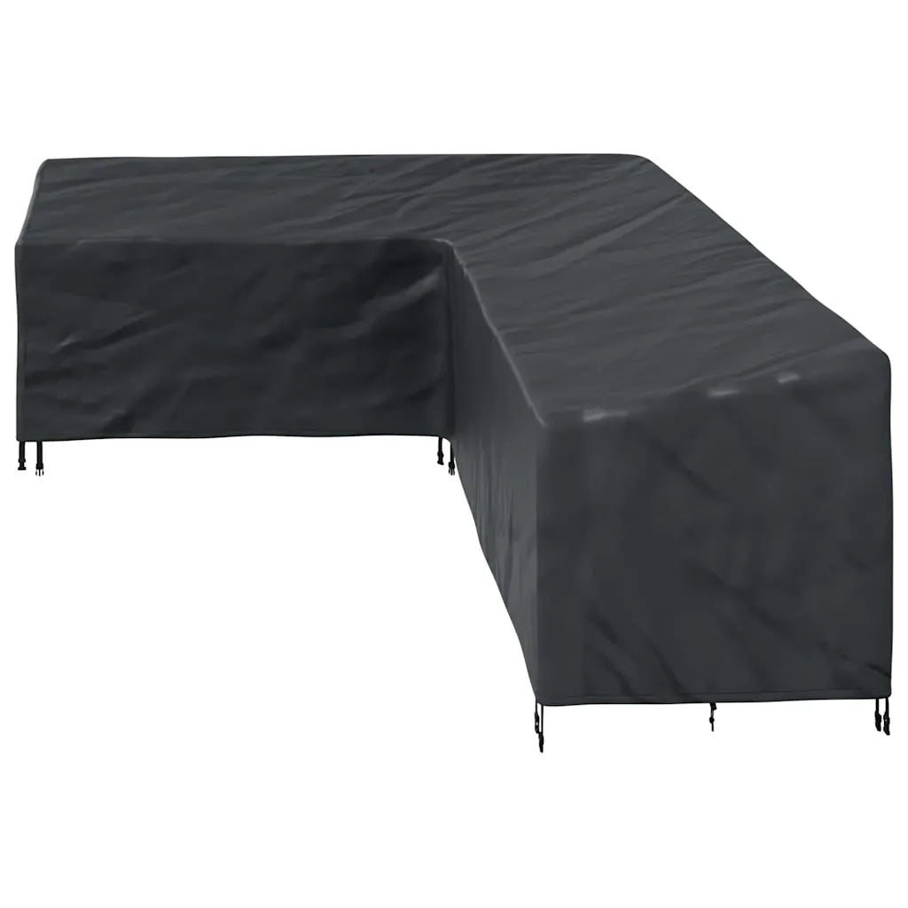 Canapé de jardin avec housse de protection noire installée, protection optimale toute l'année

