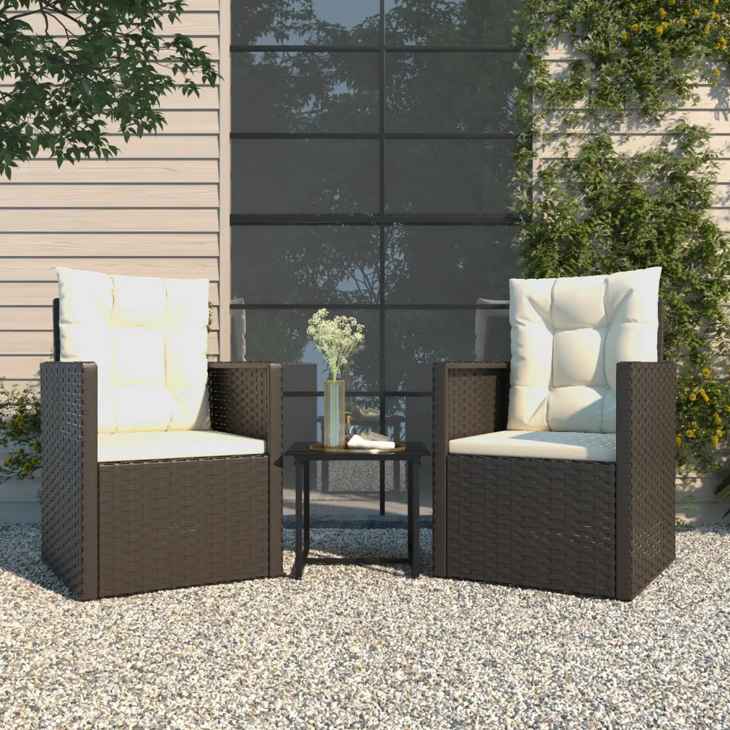 Salon de jardin extérieur noir avec coussins blancs sur terrasse moderne.