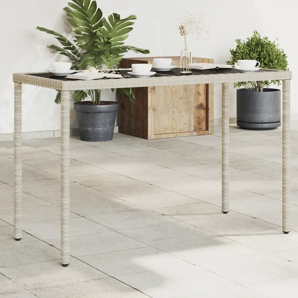Table jardin rotin PE gris clair plateau verre trempé design moderne